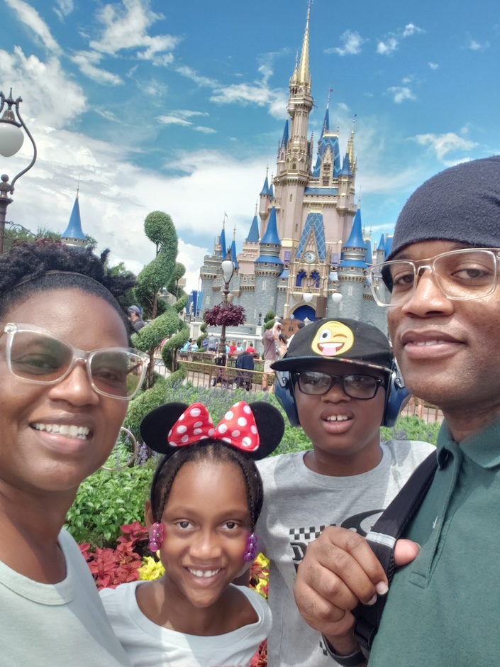 Family pic in front of Cinderella Castle